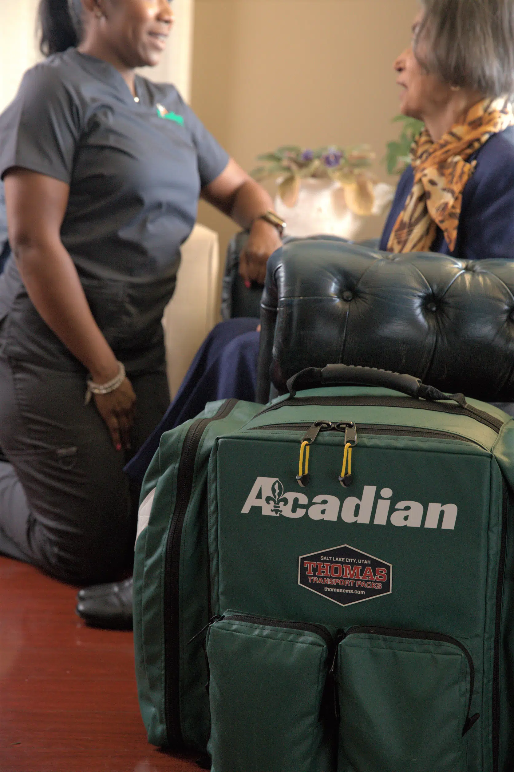 Acadian Health team with patient Acadian Health team with patient