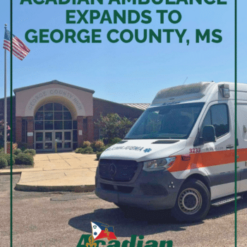 A photo of an Acadian Ambulance in front of George County High School