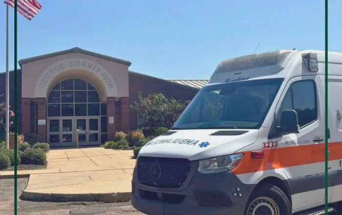 A photo of an Acadian Ambulance in front of George County High School