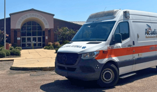 An Acadian Ambulance parked in front of George County High School.