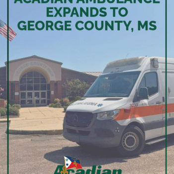 An Acadian Ambulance unit parked in front of George County High School.