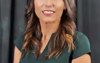 A professional headshot of Jodi Conachen