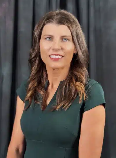 A professional headshot of Jodi Conachen