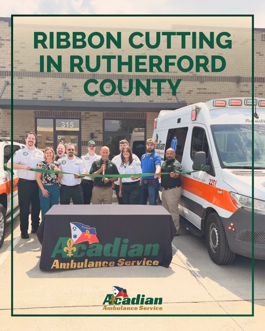 Acadian Ambulance Tennessee team members cut a green ribbon in front of Acadian's new station in Rutherford County.