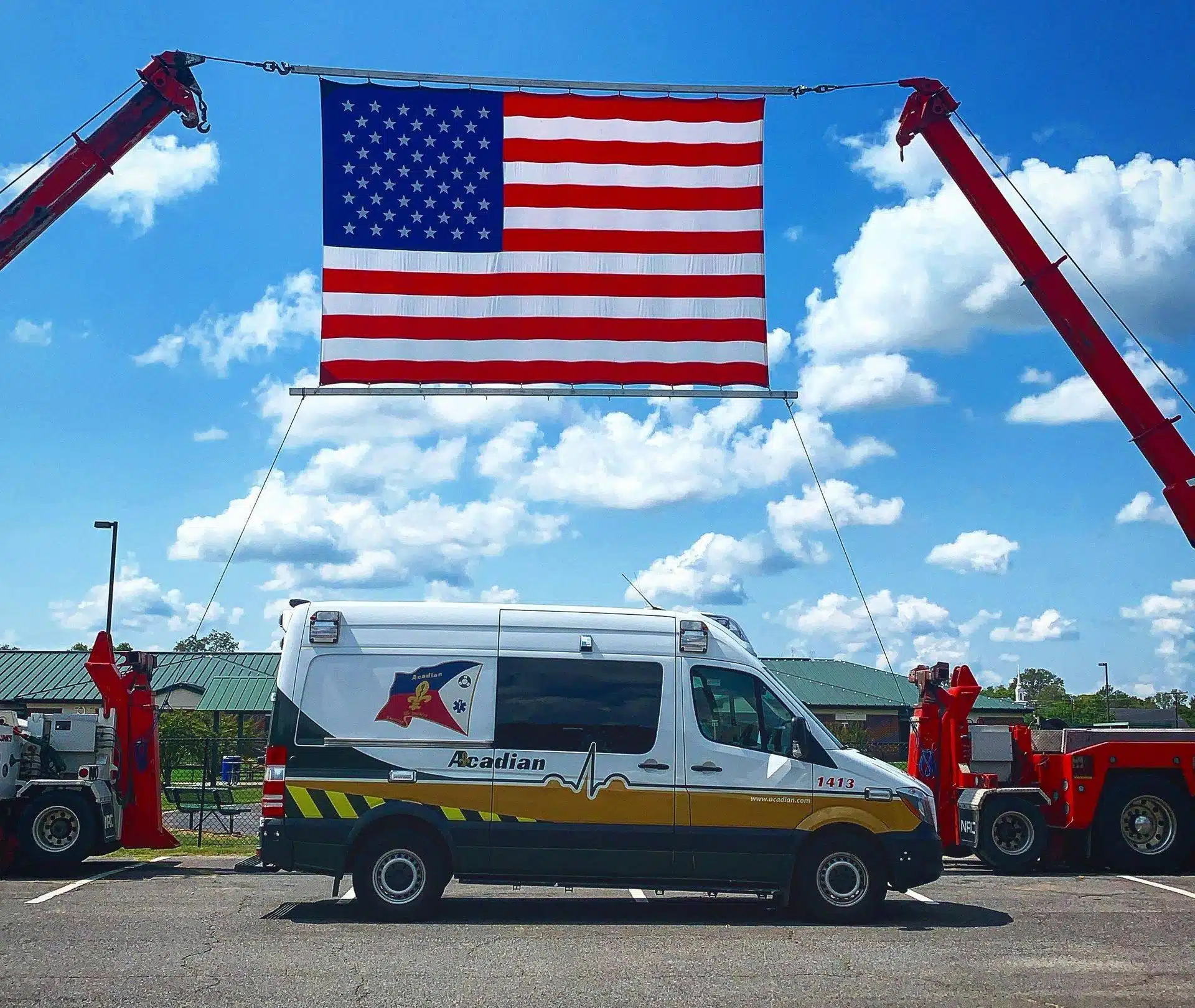 Acadian Ambulance van with US flag